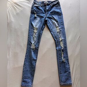 Bedazzled ripped skinny jeans
